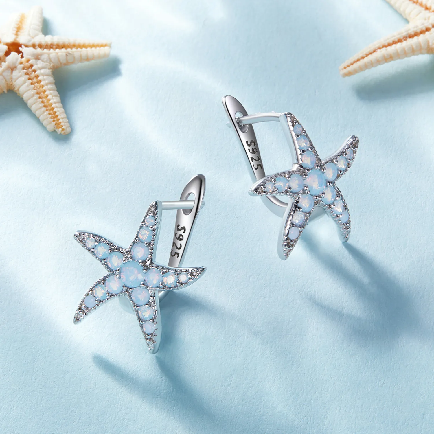 Pandora style hoops earrings featuring a starfish design - BSE840