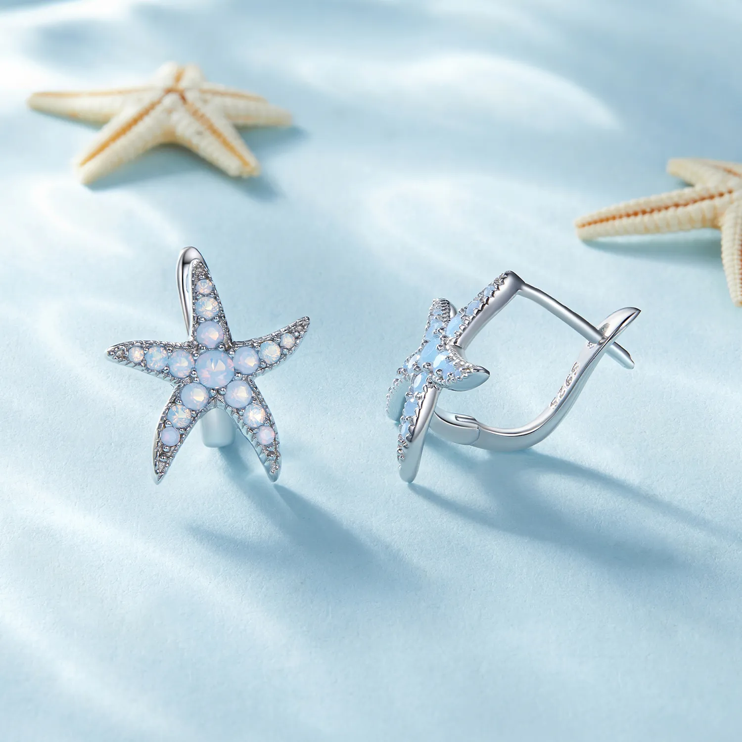 Pandora style hoops earrings featuring a starfish design - BSE840